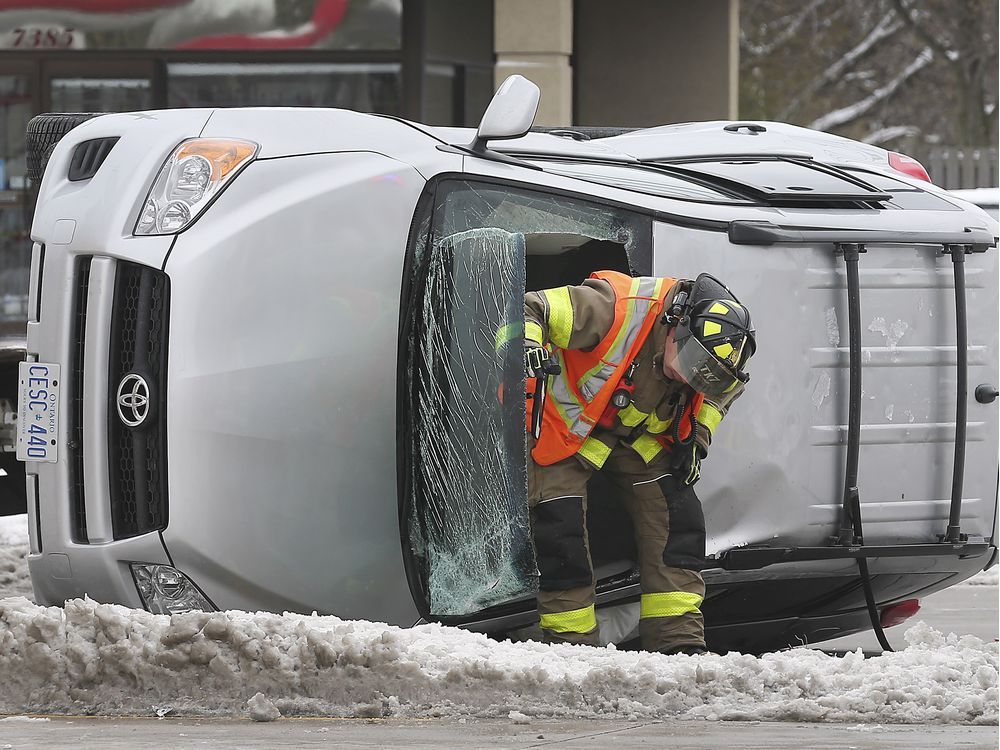 Photos: Rollover accident snarls traffic, no major injuries